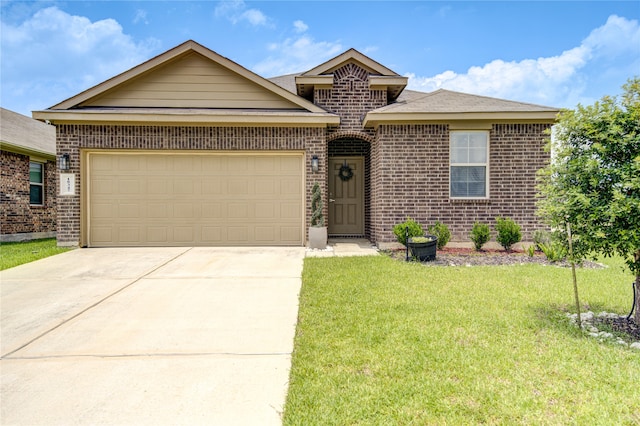 view of front of home featuring a front yard and a garage