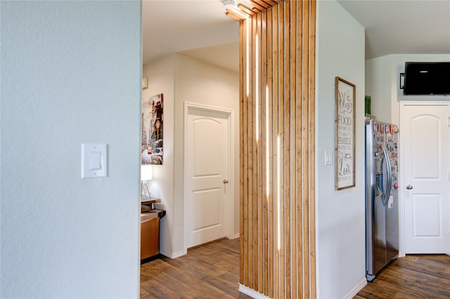 corridor featuring dark hardwood / wood-style floors