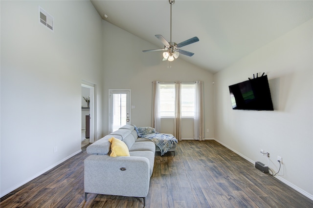 living room with ceiling fan, dark hardwood / wood-style flooring, and high vaulted ceiling