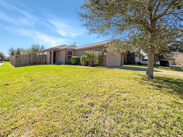 ranch-style house with a front lawn and a garage