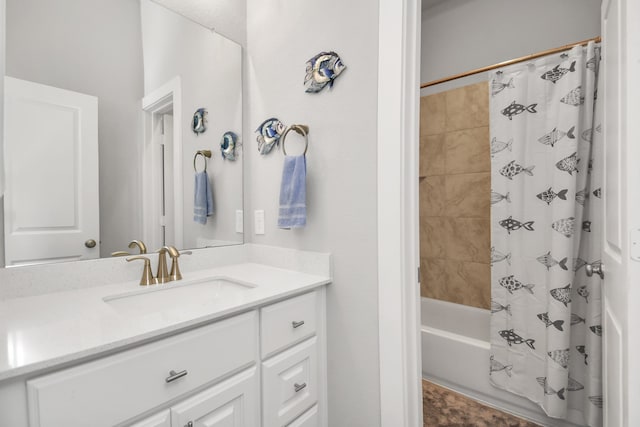 bathroom with shower / bath combo and vanity