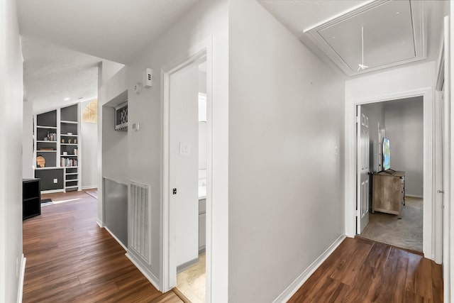 hallway featuring dark hardwood / wood-style floors