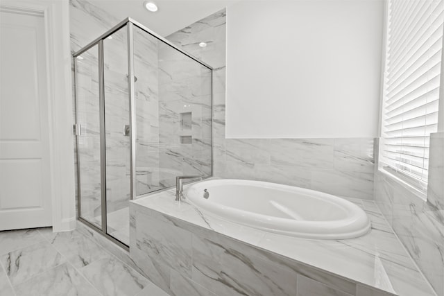 full bath featuring a marble finish shower, recessed lighting, marble finish floor, and a bath