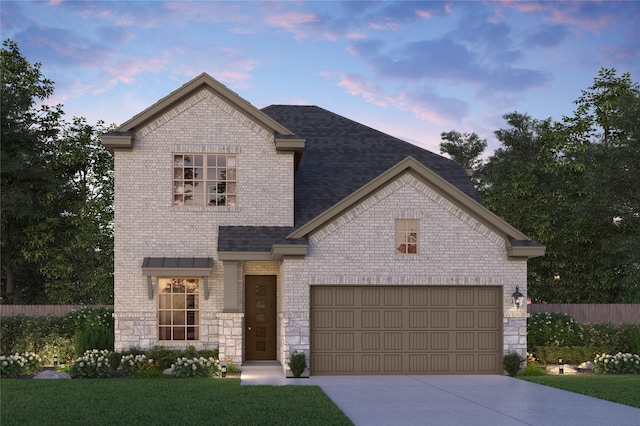 view of front of property featuring a garage