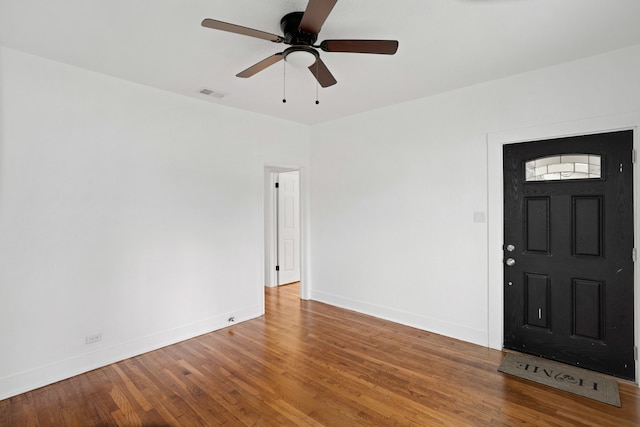 entryway featuring ceiling fan and wood-type flooring