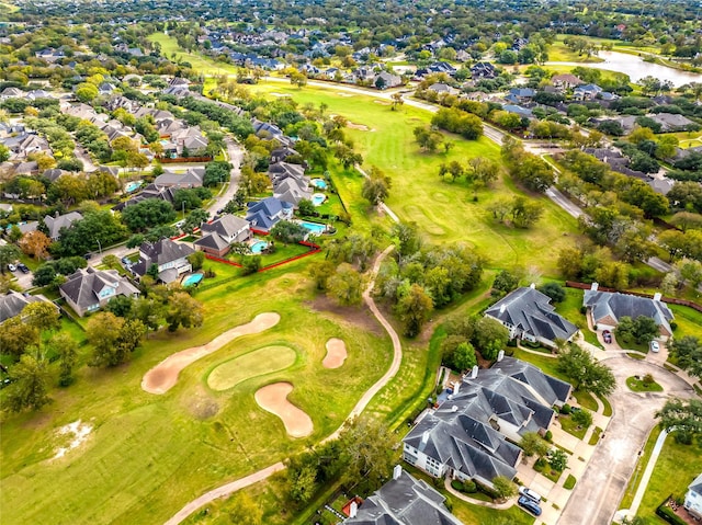 bird's eye view with golf course view and a residential view