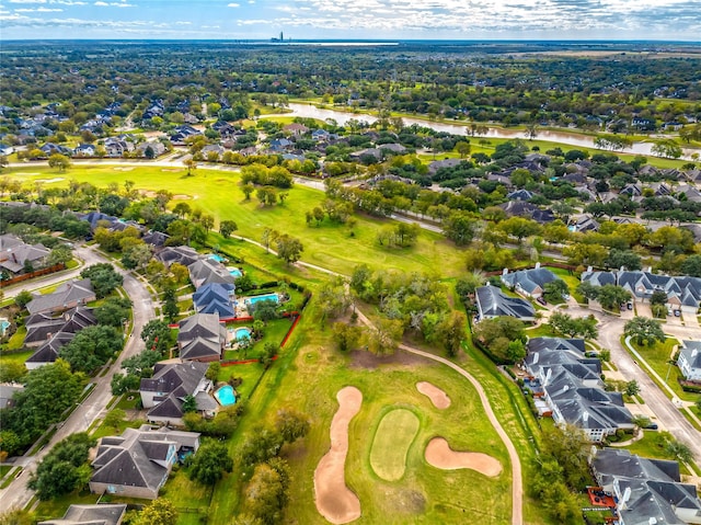 bird's eye view with golf course view and a residential view