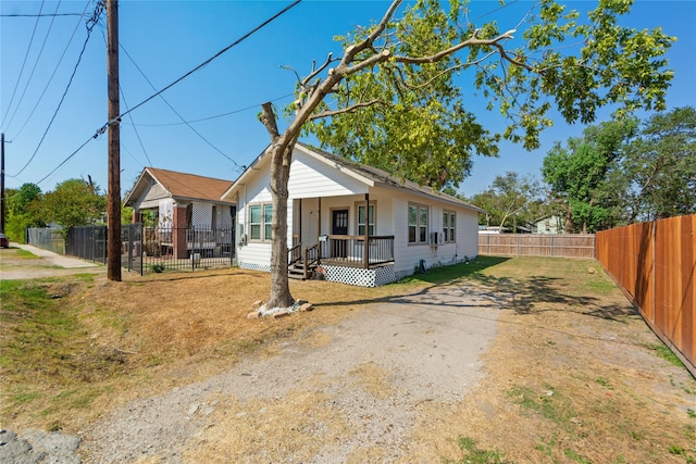 bungalow-style home featuring covered porch