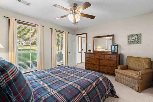 172 Little Dove, Livingston, TX 77351 - bedroom featuring light colored carpet and a ceiling fan