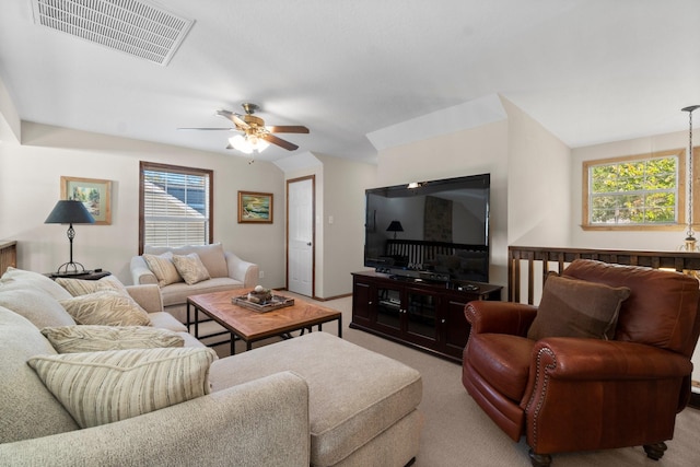 172 Little Dove, Livingston, TX 77351 - living room featuring healthy amount of natural light, ceiling fan, and carpet flooring