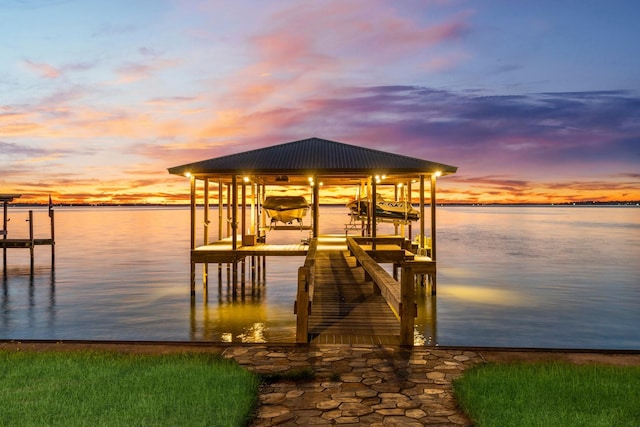 dock area featuring a water view