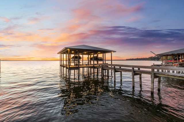 dock area featuring a water view