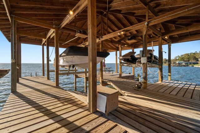 dock area featuring a water view