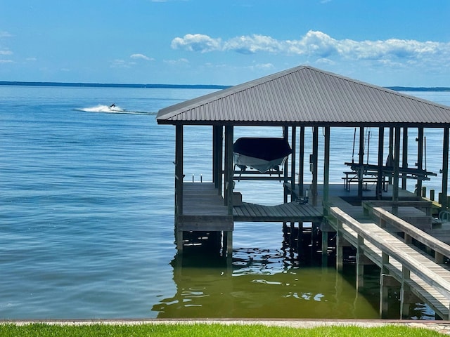 172 Little Dove, Livingston, TX 77351 - dock area featuring boat lift and a water view