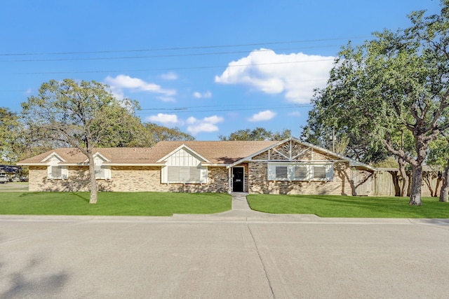 view of front of home with a front yard