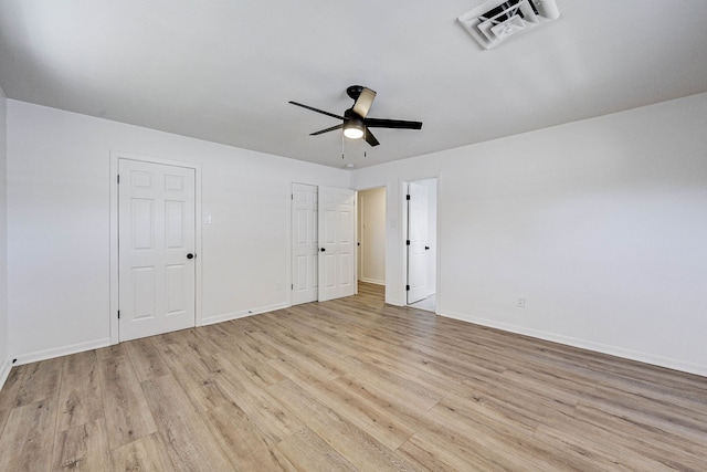 unfurnished bedroom with light hardwood / wood-style flooring and ceiling fan