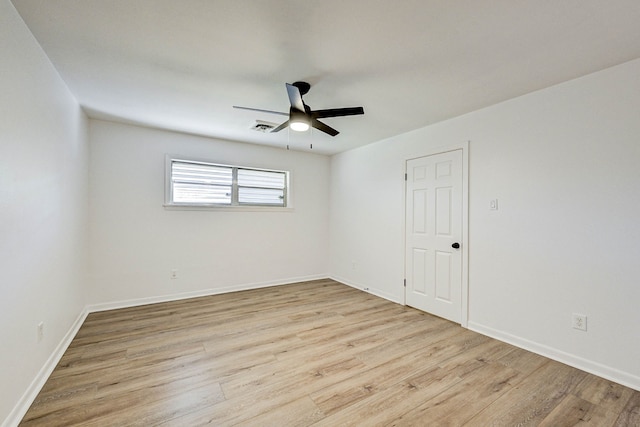 unfurnished room with ceiling fan and light hardwood / wood-style flooring