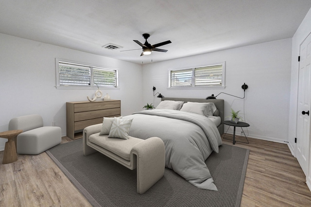 bedroom featuring wood-type flooring and ceiling fan