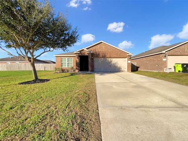 ranch-style home with a front yard and a garage