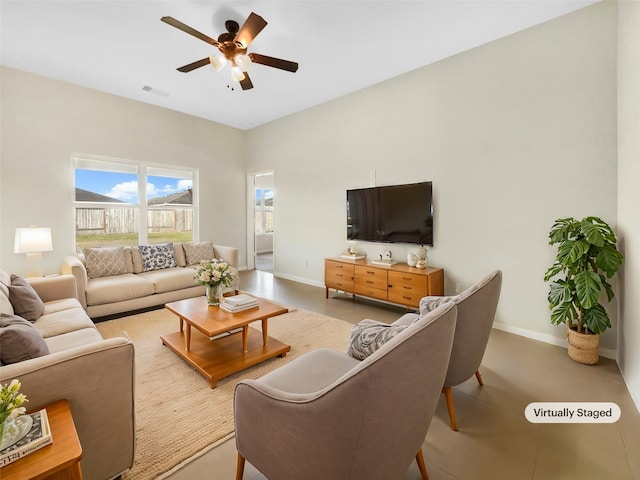 living room featuring ceiling fan