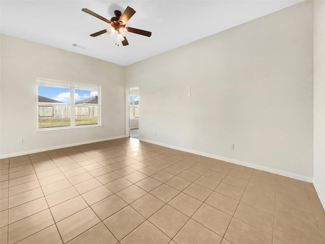 5122 Breezy Parke Ln, Rosenberg, TX 77469 - unfurnished room with ceiling fan, light tile patterned floors, and baseboards