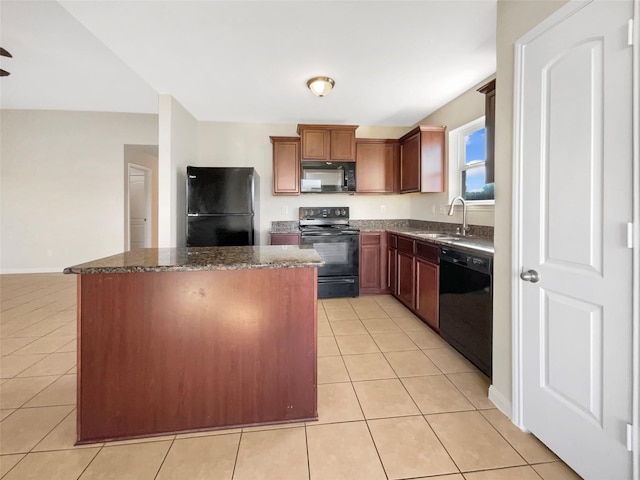 5122 Breezy Parke Ln, Rosenberg, TX 77469 - kitchen with black appliances, a sink, light tile patterned floors, and a center island