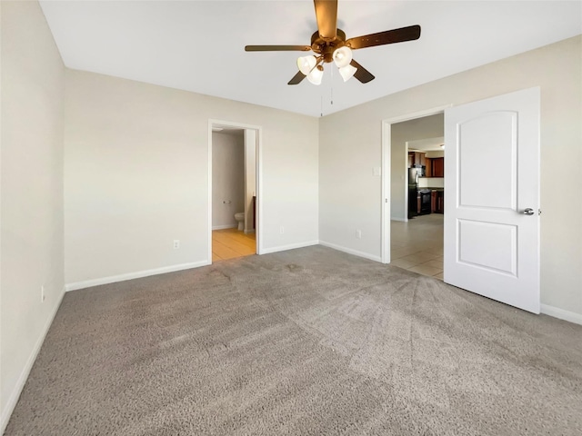 5122 Breezy Parke Ln, Rosenberg, TX 77469 - carpeted spare room with ceiling fan and baseboards