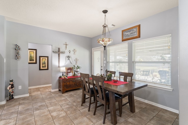 dining room with light tile patterned floors