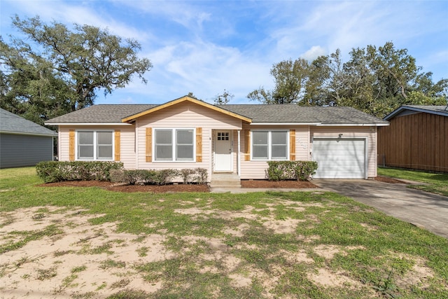 single story home with a garage and a front yard