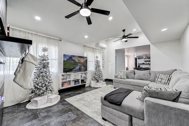 living room featuring a wall mounted air conditioner and ceiling fan