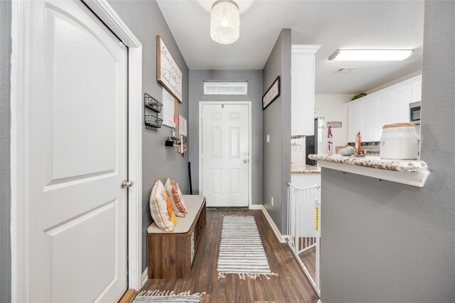 entryway featuring dark hardwood / wood-style floors