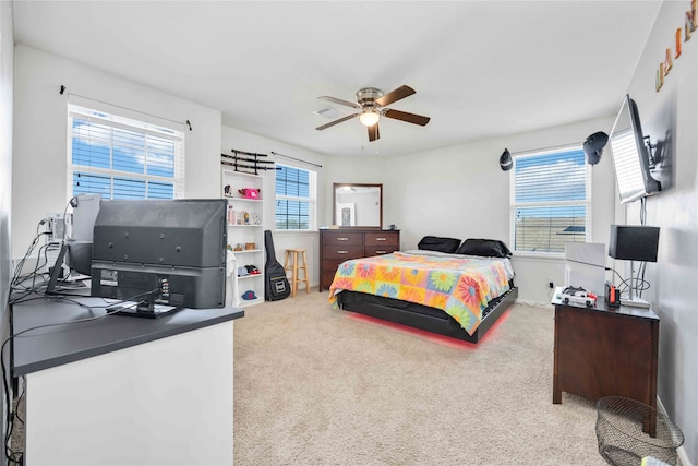 bedroom featuring ceiling fan and carpet floors