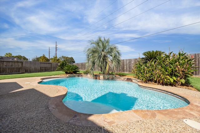 view of swimming pool featuring a patio