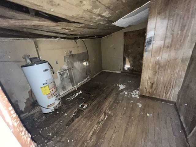 utility room featuring gas water heater