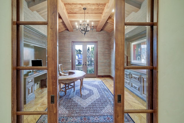 office space featuring french doors, parquet floors, an inviting chandelier, and lofted ceiling with beams