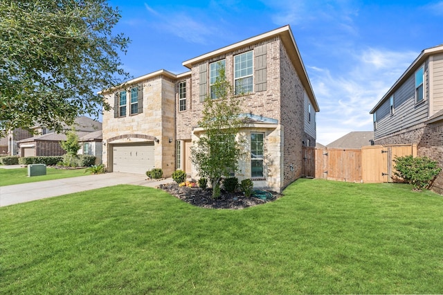 view of front of home featuring a front yard and a garage