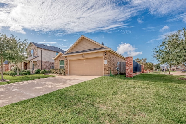 view of front of home with a garage and a front lawn