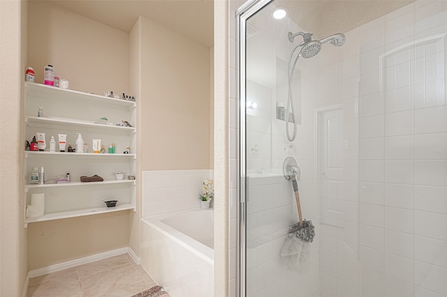 bathroom with tile patterned floors and plus walk in shower