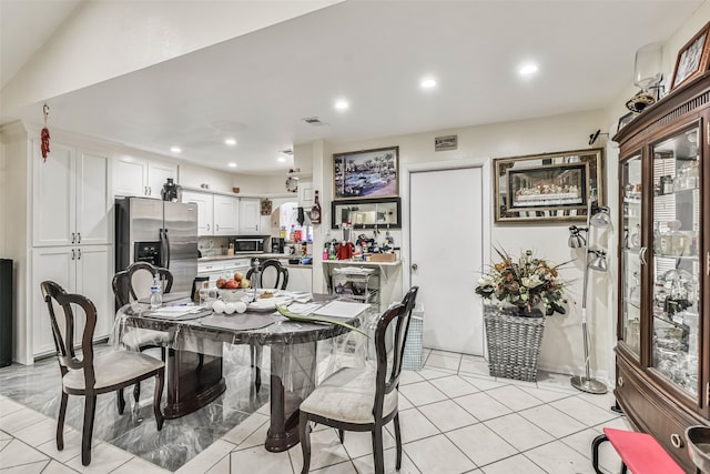 view of tiled dining space