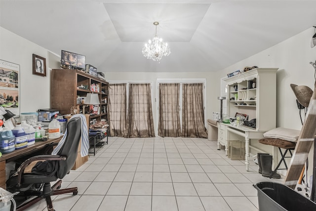 tiled home office with vaulted ceiling and a notable chandelier