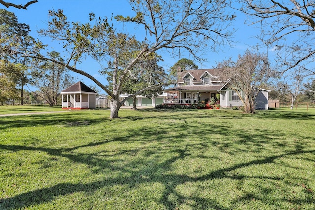 view of yard featuring a porch