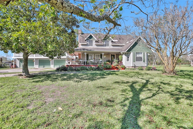 cape cod-style house featuring a porch and a front lawn