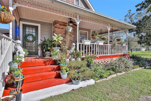 view of exterior entry with a porch