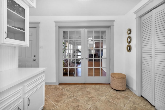 entryway featuring french doors