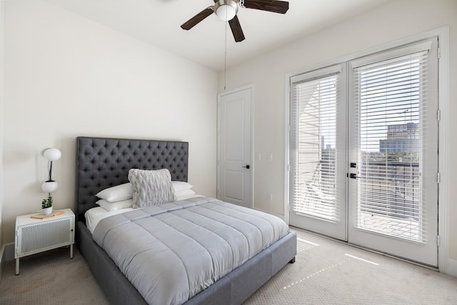 bedroom featuring carpet, ceiling fan, access to outside, and french doors