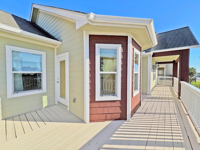 entrance to property with a wooden deck