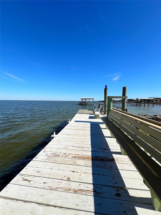 view of dock featuring a water view