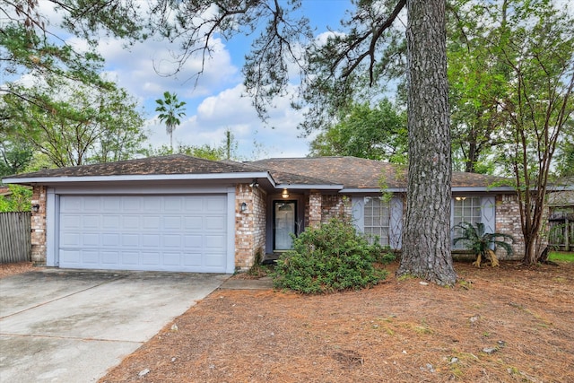 single story home featuring a garage