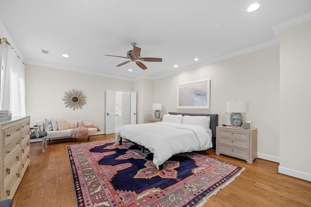 bedroom with ceiling fan, ornamental molding, and light wood-type flooring