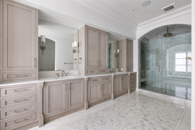 bathroom featuring tile patterned flooring, vanity, an enclosed shower, and crown molding